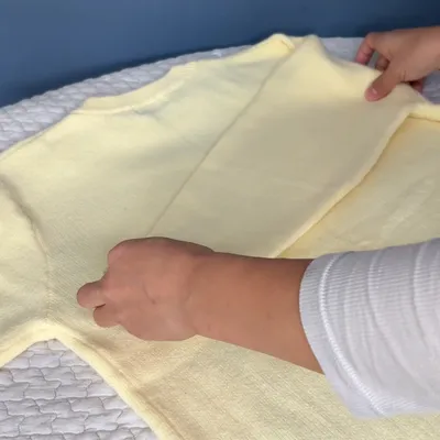 袖を重ねないことで厚みを抑える方法